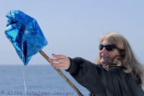 a person holding a kite